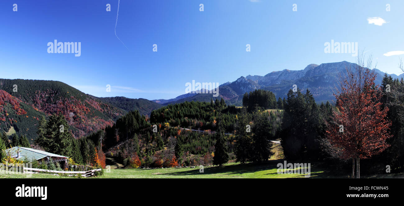 Panorama of the Ammergauer Alps at the border of Germany and Austria in autumn, shot taken from the Buchenbergalm in Allgäu, Bav Stock Photo