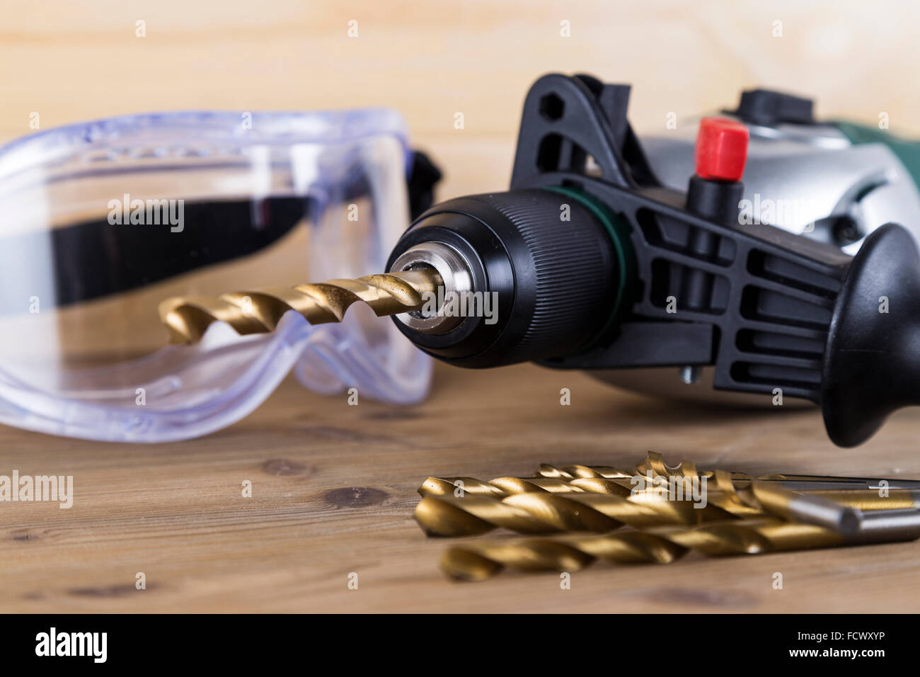 Power Drill with Bits and Goggles Stock Photo Alamy