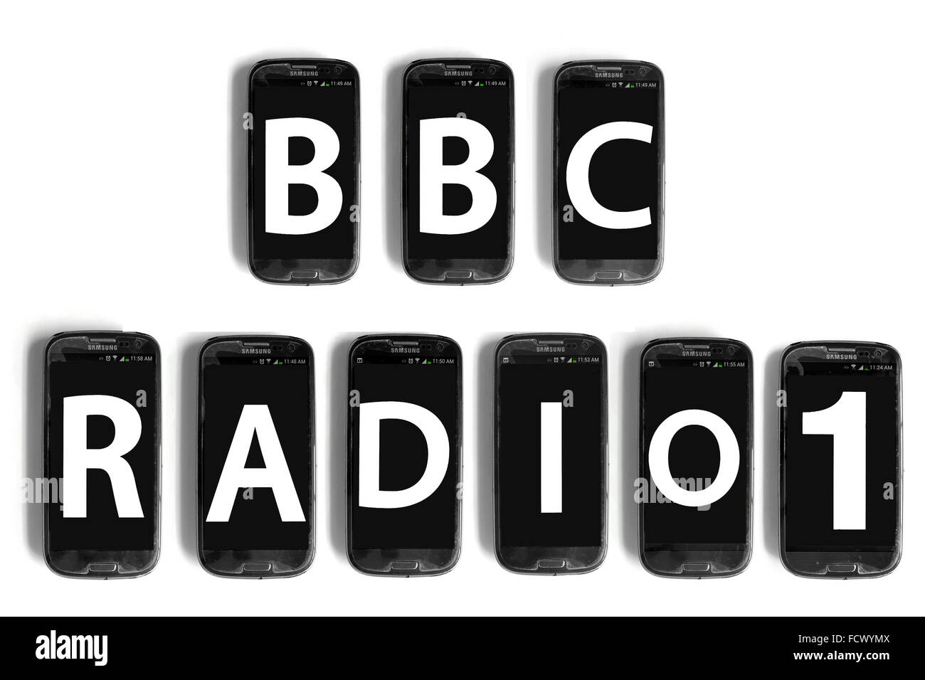 BBC Radio1 written on the screens of smartphone photographed against a white background. Stock Photo