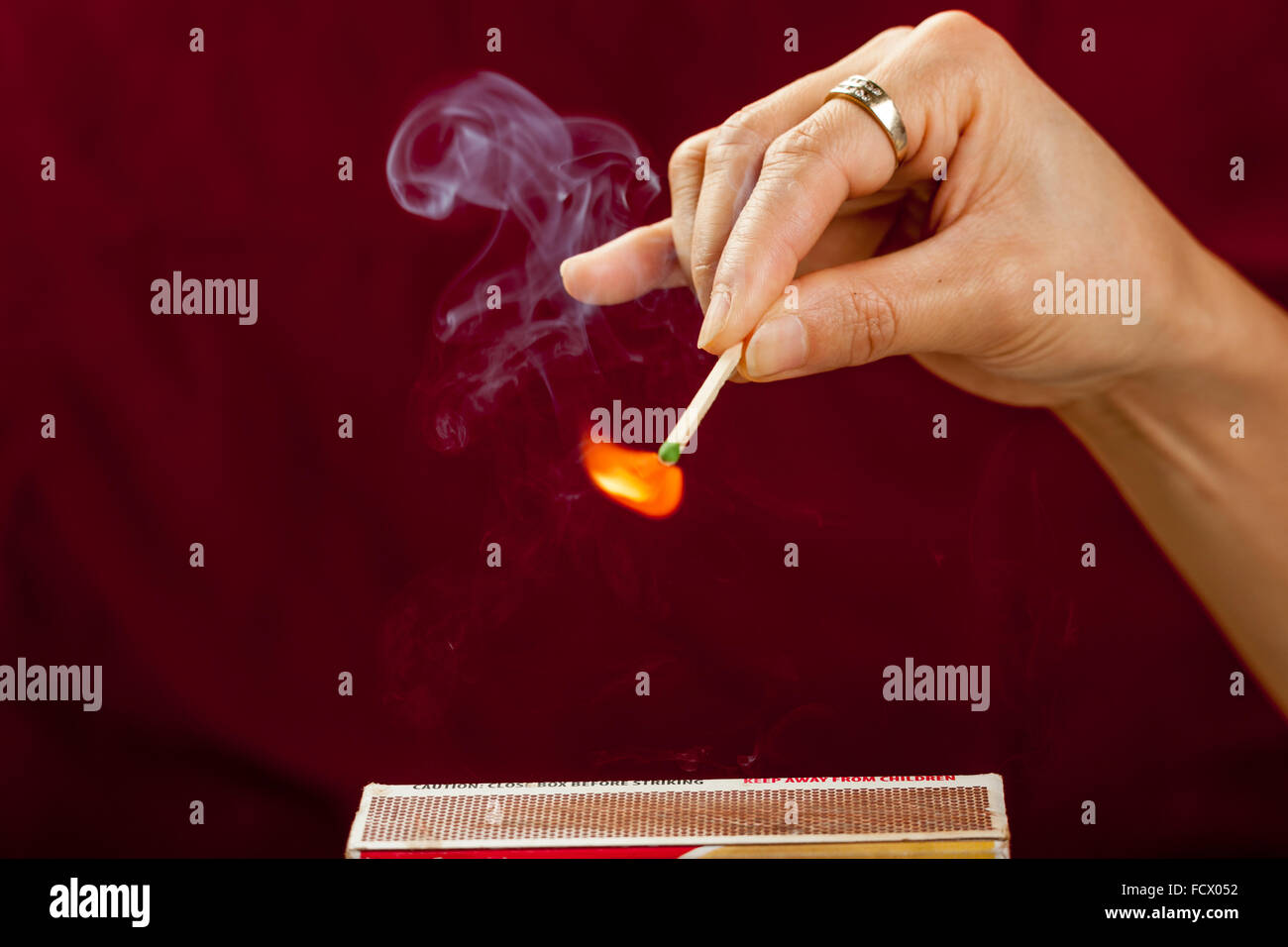 Striking a match Stock Photo Alamy