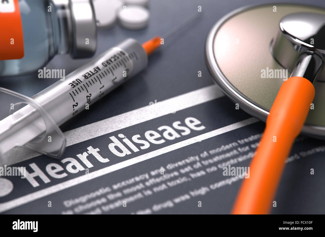 Heart disease - Printed Diagnosis with Blurred Text on Grey Background and Medical Composition - Stethoscope, Pills and Syringe. Stock Photo