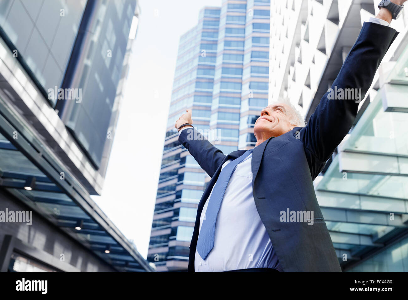 Portrait of confident businessman in suit outdoors Stock Photo - Alamy