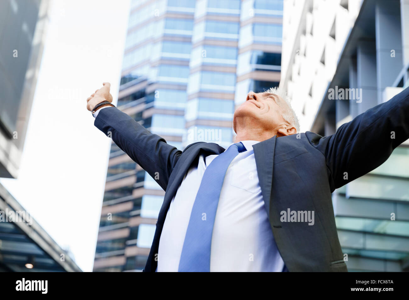 Portrait of confident businessman in suit outdoors Stock Photo - Alamy