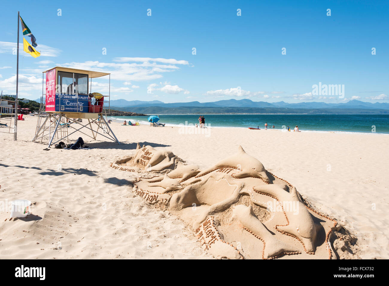 Lifeguard tower and sand sculptures at Beacon Island Beach, Plettenberg Bay, Eden District, Western Cape Province, South Africa Stock Photo