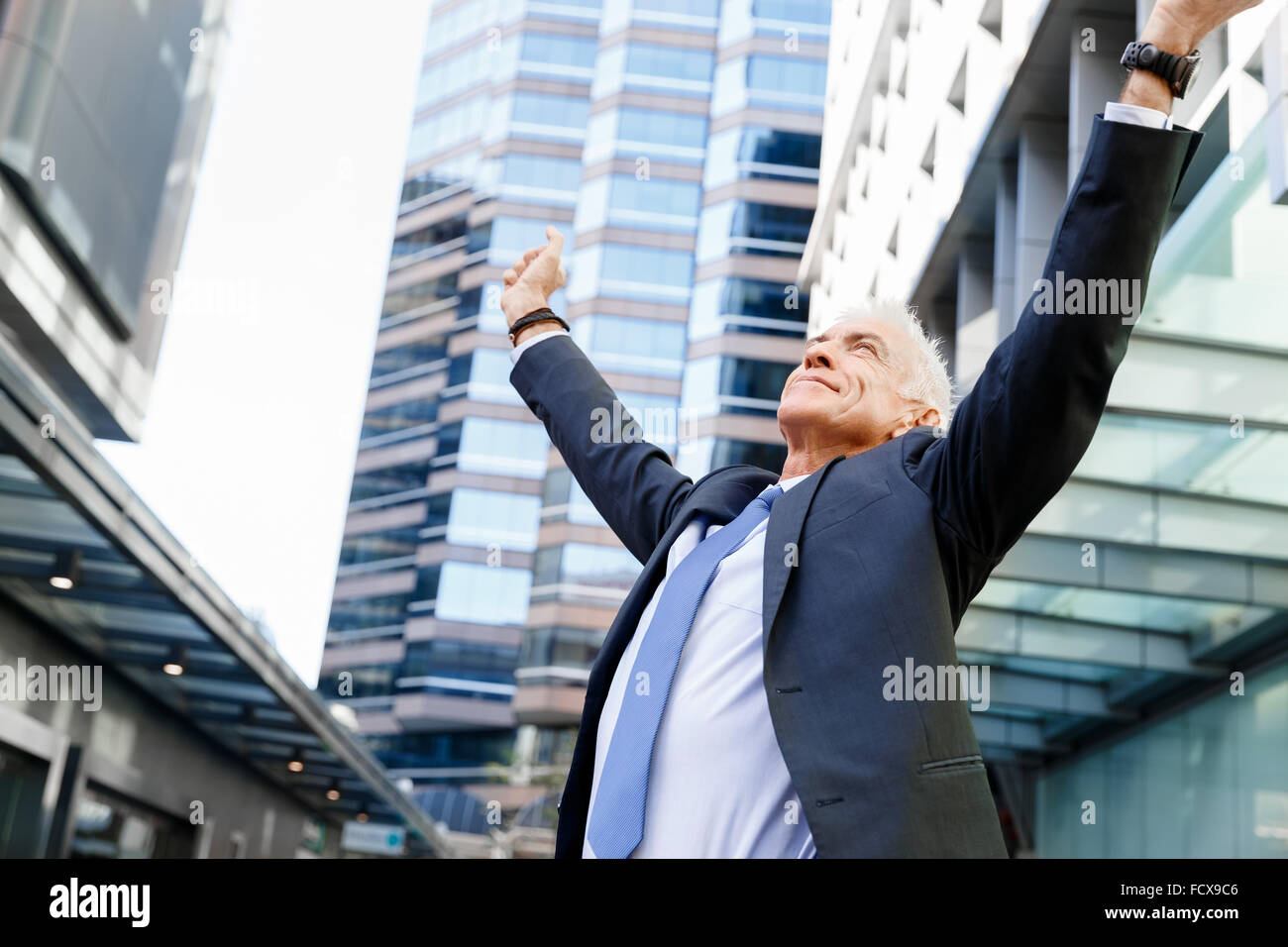 Portrait of confident businessman in suit outdoors Stock Photo - Alamy