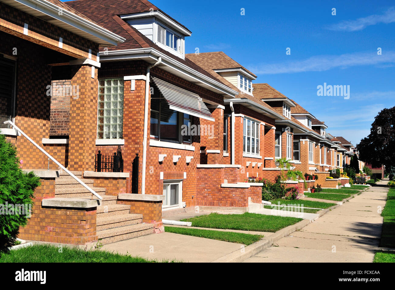 Neat row of bungalow-styled homes in the Chicago South Side neighborhood of Archer Heights. Chicago, Illinois, USA. Stock Photo