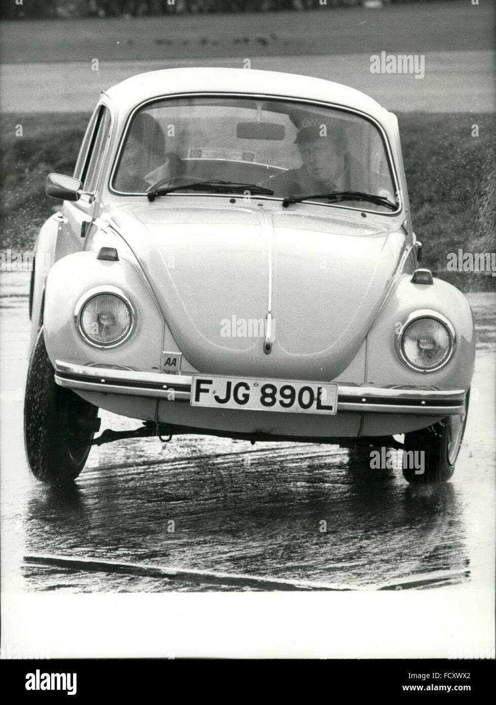 1962 - Volkswagen Teaching Drivers To Skid: A lesson in better driving for Mrs. Beryl Brenton, a private motorist, from Sgt Peter Salt Senior instructor at Kent Constabulary Driving School at Maidstone. Motorists pay &pound;5 for eight hours of lectures and two hours driving instruction in their own care. Photo shows Mrs. Beryl Brenton tackling the skid pan. © Keystone Pictures USA/ZUMAPRESS.com/Alamy Live News Stock Photo