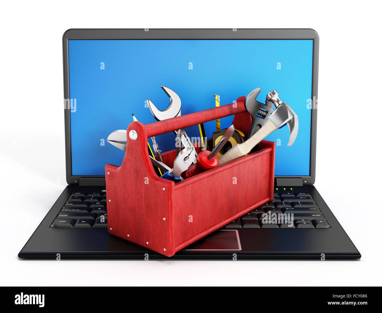Red toolbox standing on laptop computer isolated on white background