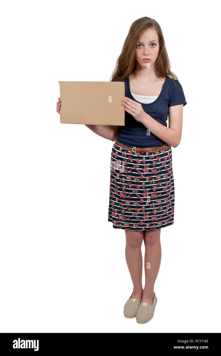 A beautiful young teenager woman holding up a blank sign Stock Photo