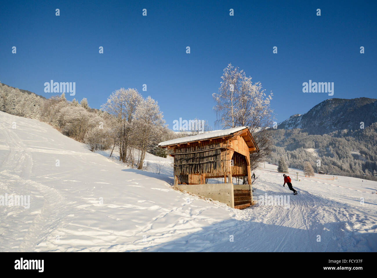Skiing in a winter landscape with wooden barn, Pitztal Alps - Tyrol Austria Europe Stock Photo