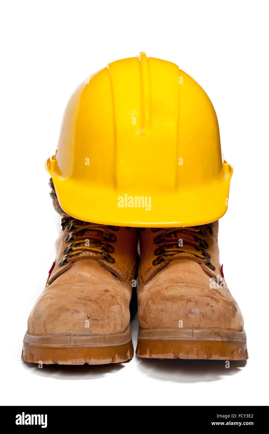 Construction PPE - Steel toe boots and a yellow hard hat Stock Photo - Alamy