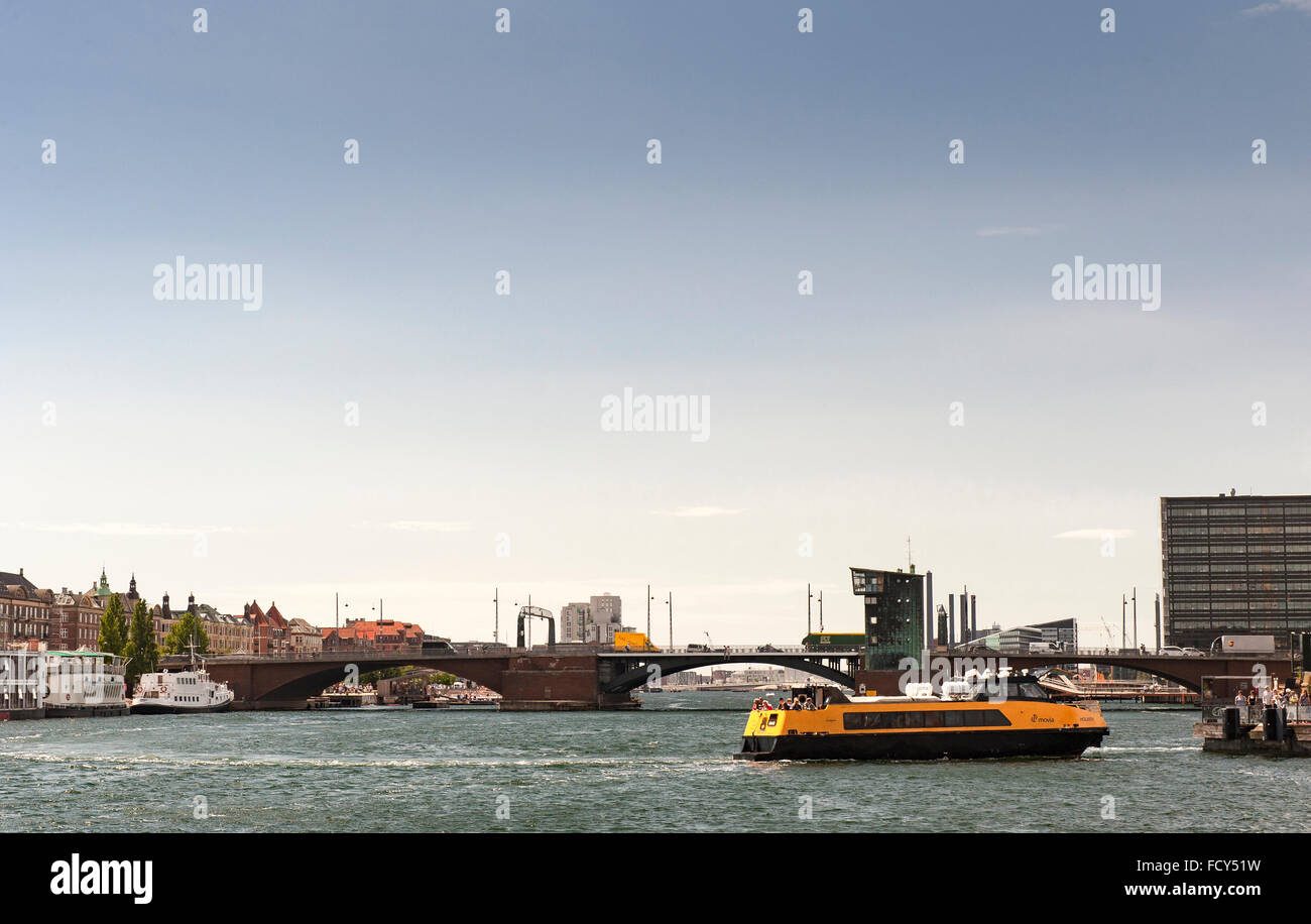 A harbour taxi near Langebro - a bascule bridge across the Inner Harbour of Copenhagen, Denmark Stock Photo