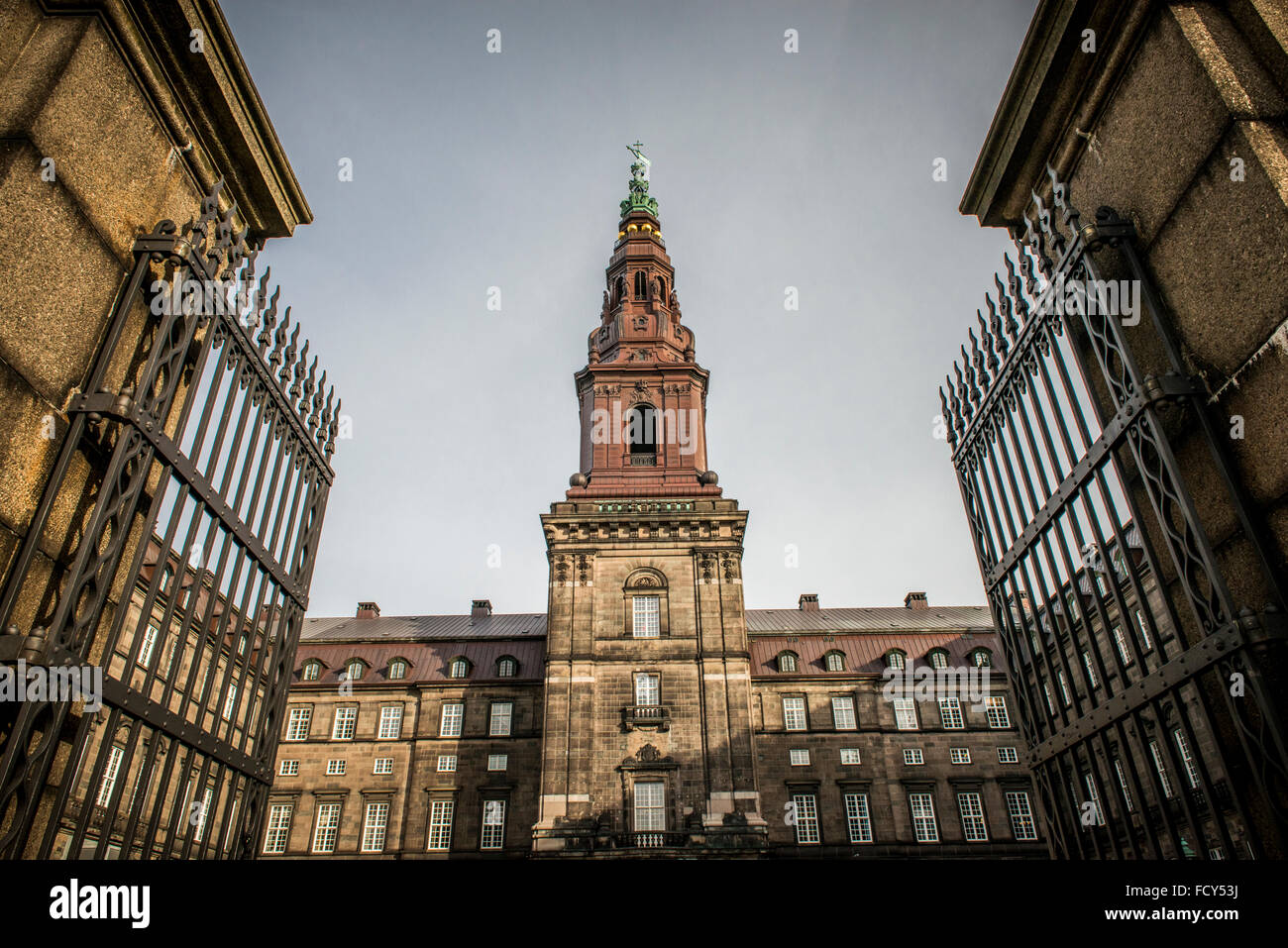 Christiansborg Palace is a palace and government building on the islet of Slotsholmen in central Copenhagen, Denmark. It is the Stock Photo