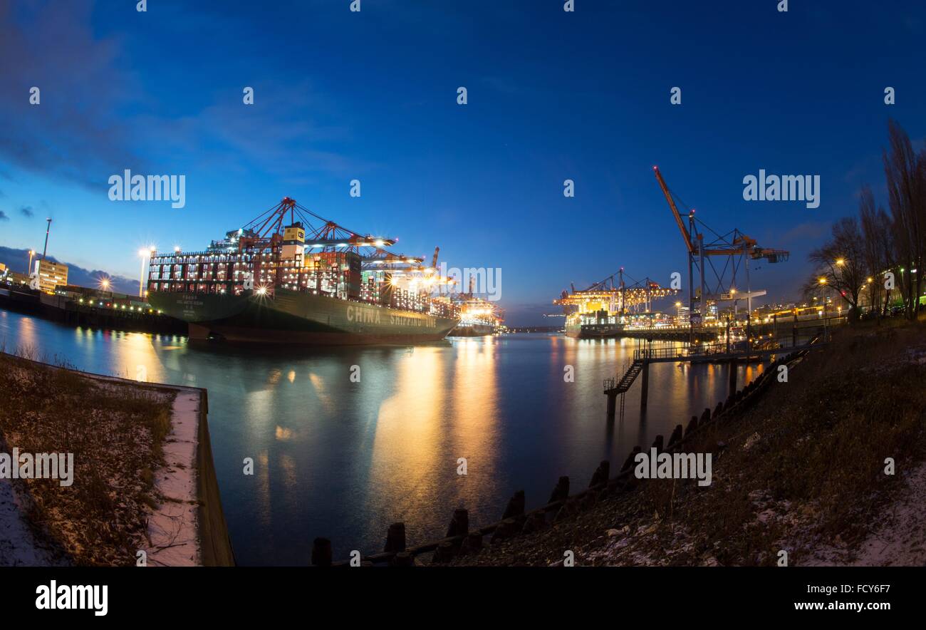 Cargo vessels are docked in the port of Hamburg, 20 January 2016 in Hamburg, Germany. Stock Photo