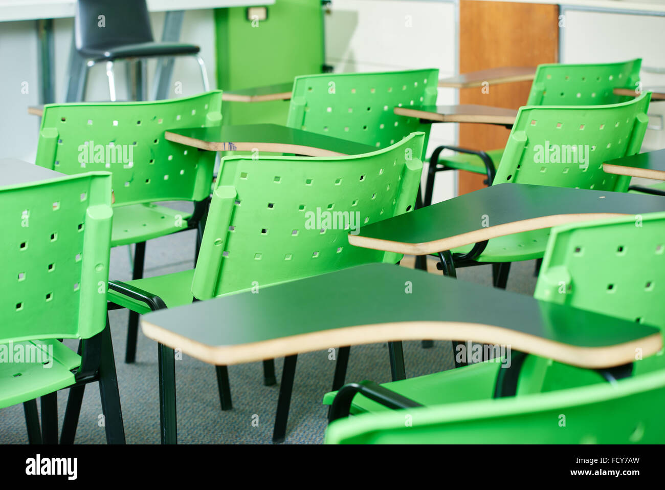 Closeup student chair seat and desk in classroom background with on wooden  floor. Education and Back to school concept. Architecture interior. Social  Stock Photo - Alamy