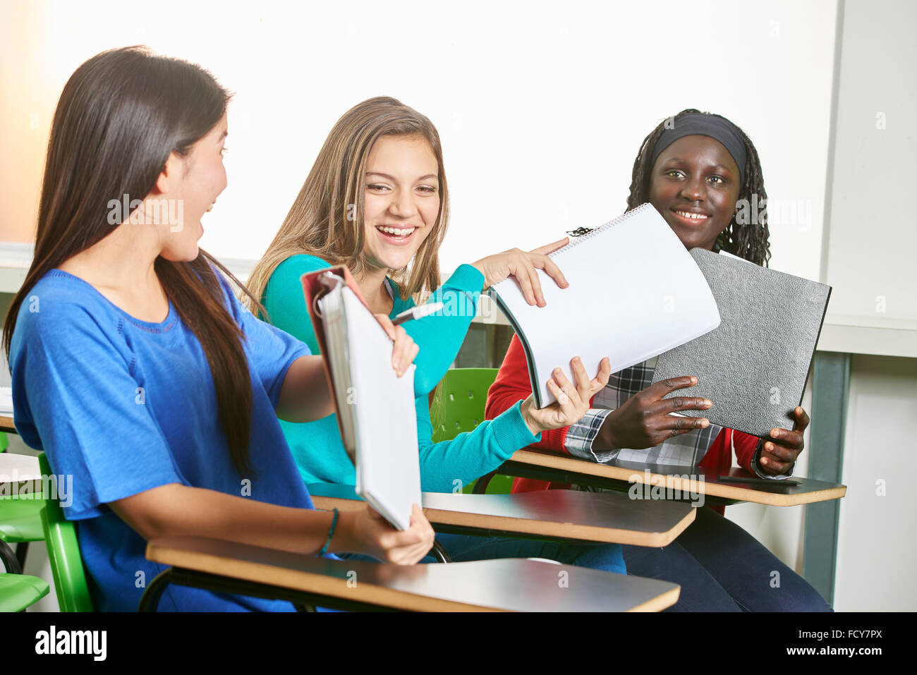 Interracial group of girls have fun at school Stock Photo