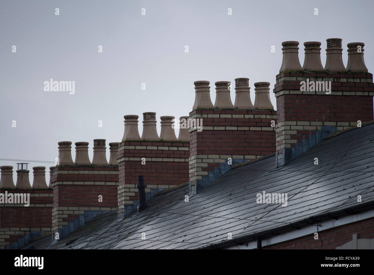 Chimneys on terraced houses in Cardiff, South Wales. Stock Photo