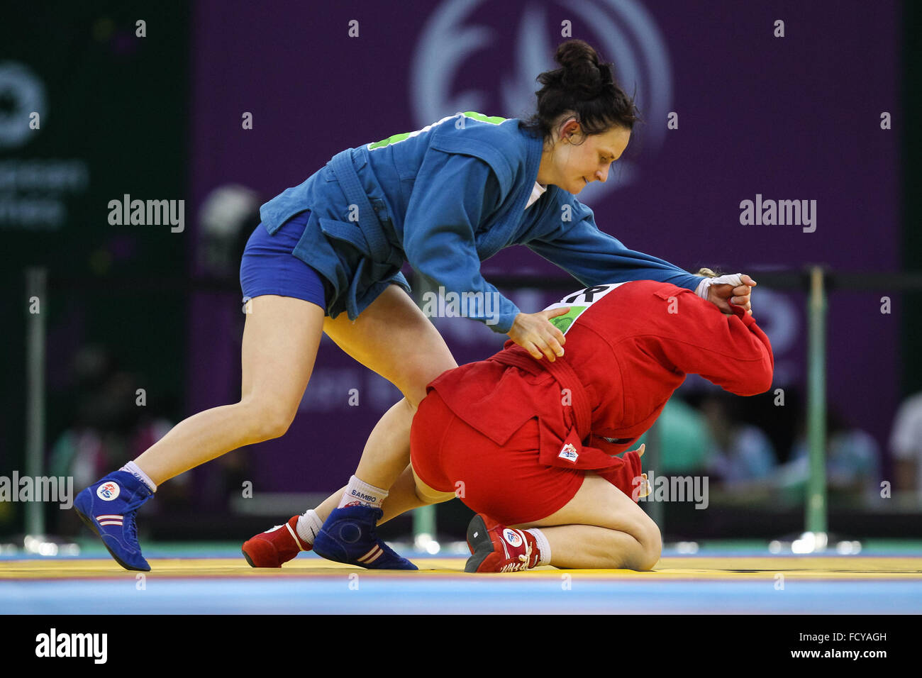 Olena Sayko (UKR, red) vs Tatsiana Matsko (BLR, blue). Final. Women's 64kg. Sambo. Heydar Aliyev Arena. Baku2015. 1st European Games. Baku. Azerbaijan. 22/06/2015 Stock Photo