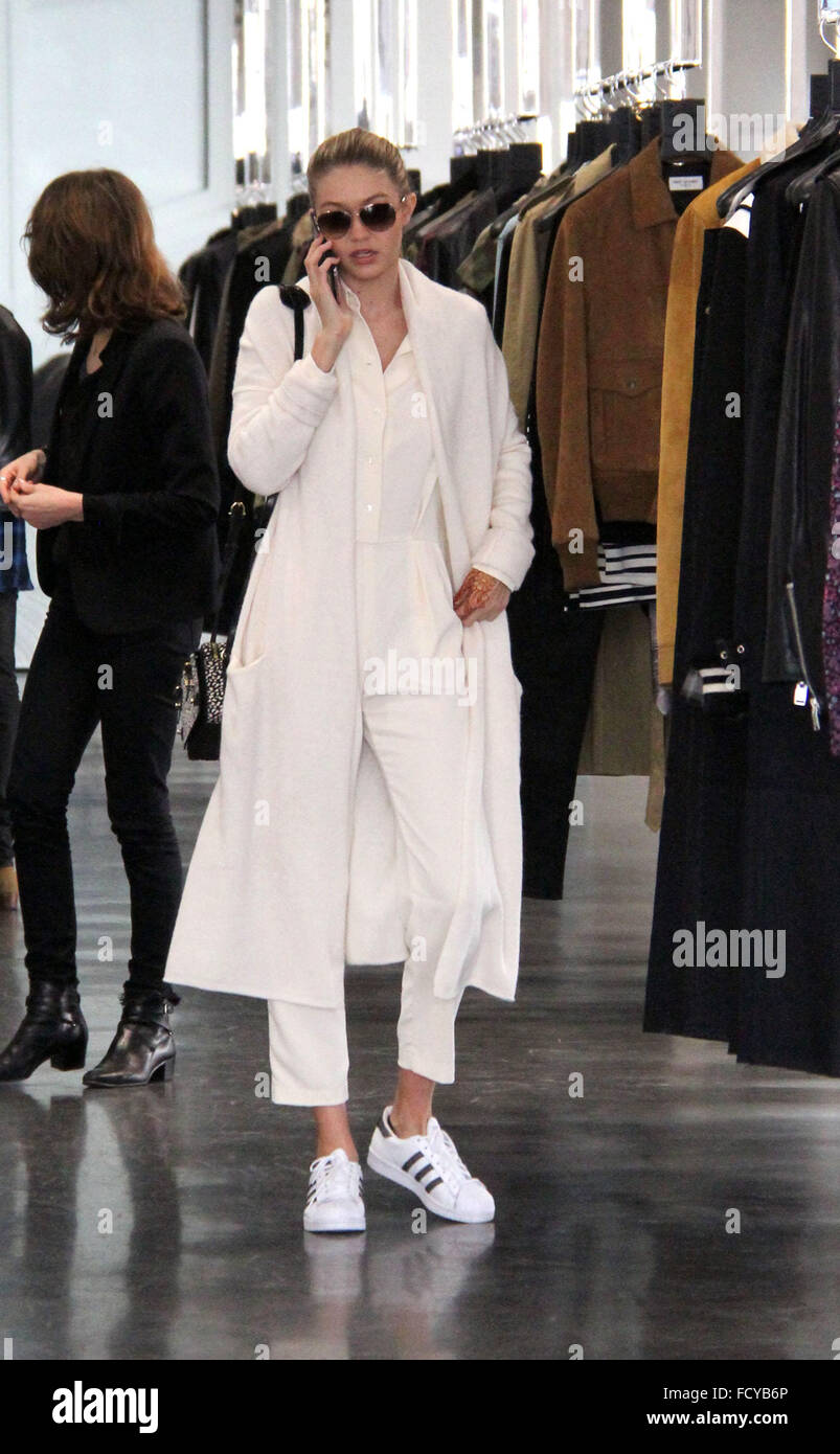 Sisters Bella and Gigi Hadid go clothes shopping at Yves Saint