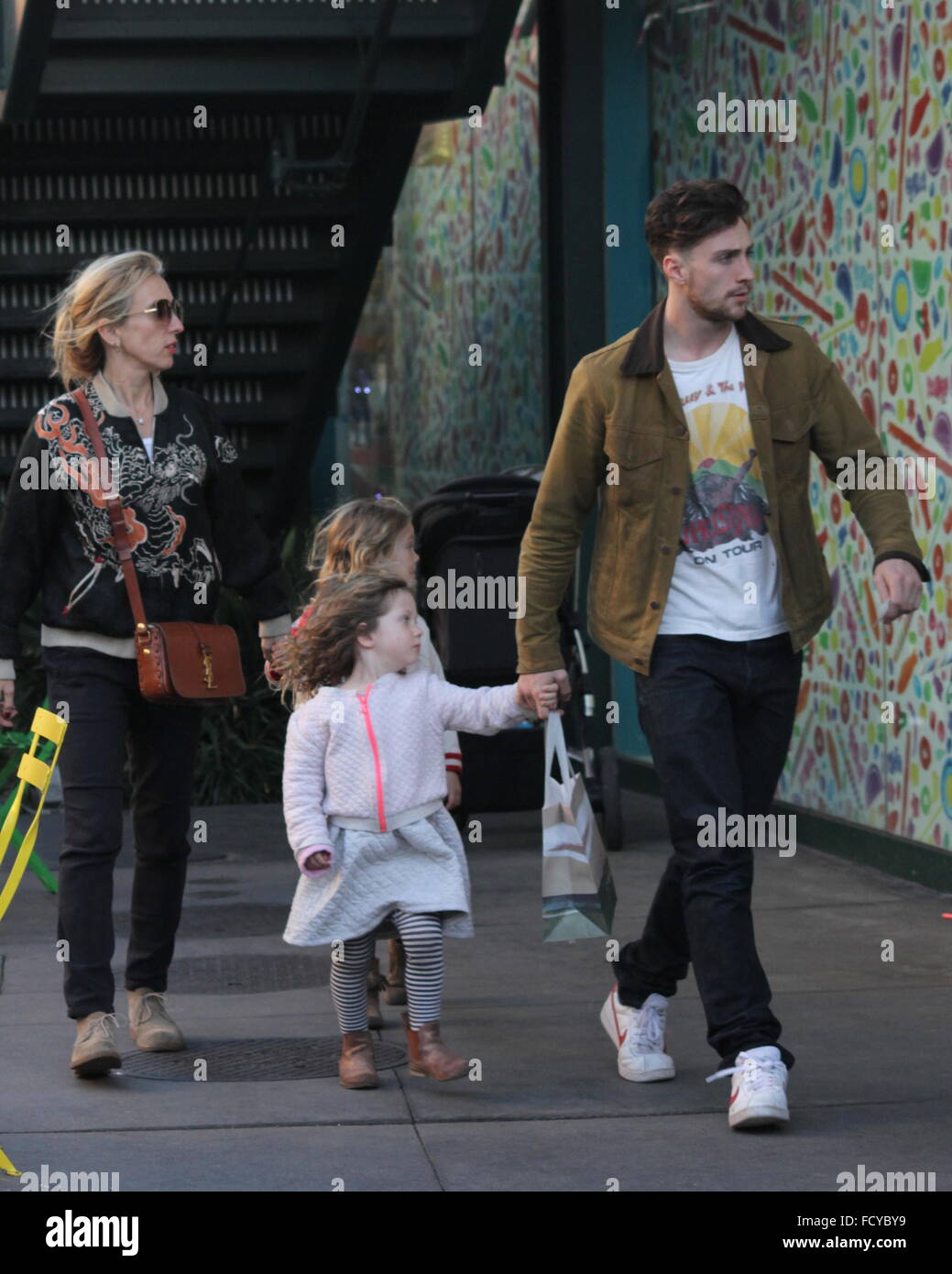 Aaron and Sam Taylor-Johnson take their daughter's Romy Hero and Wylda Rae christmas shopping at