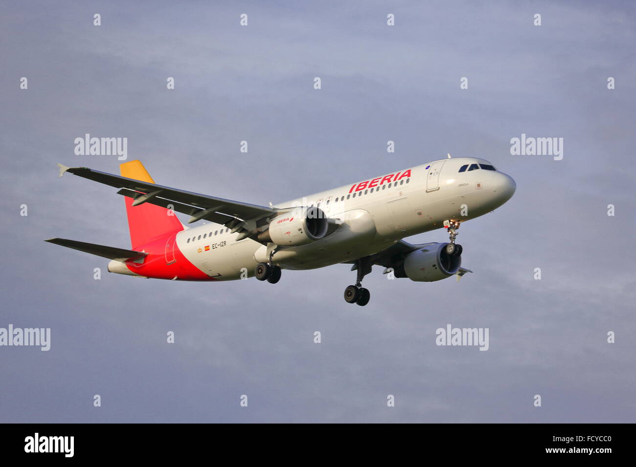 Iberia Airlines Airbus A320-214 EC-IZR landing at Heathrow Stock Photo