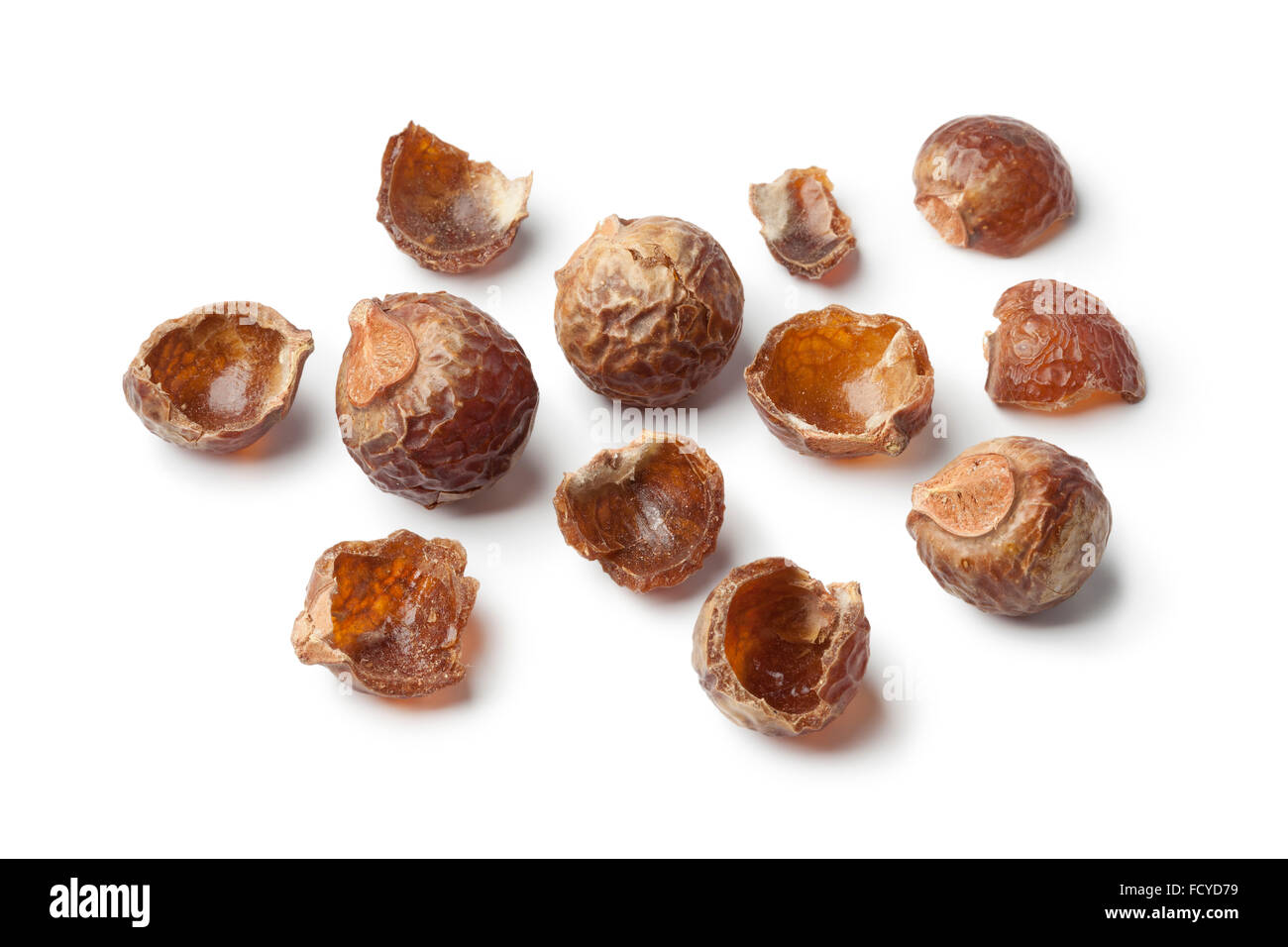 Nutshells of soapnuts on white background Stock Photo