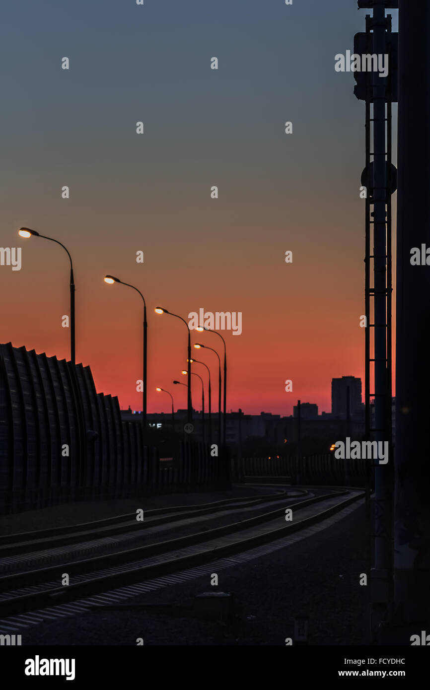 Nice panorama of evening railroad lanterns in city Stock Photo