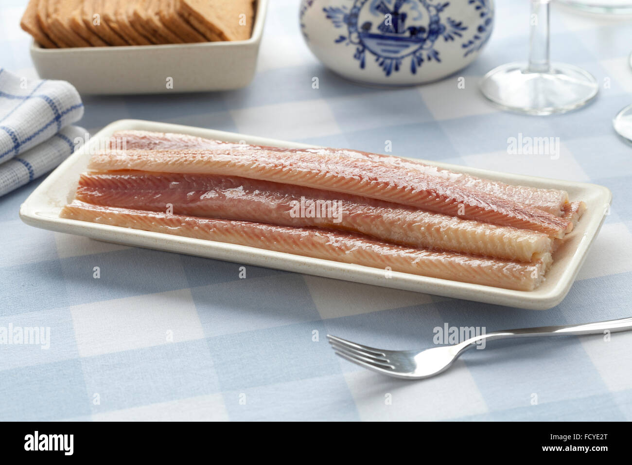 Dish with filleted smoked eel Stock Photo