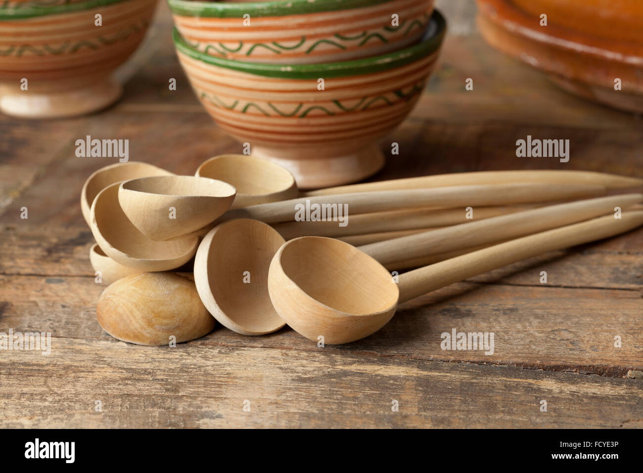 Traditional Moroccan wooden soup spoons and traditional bowls Stock Photo