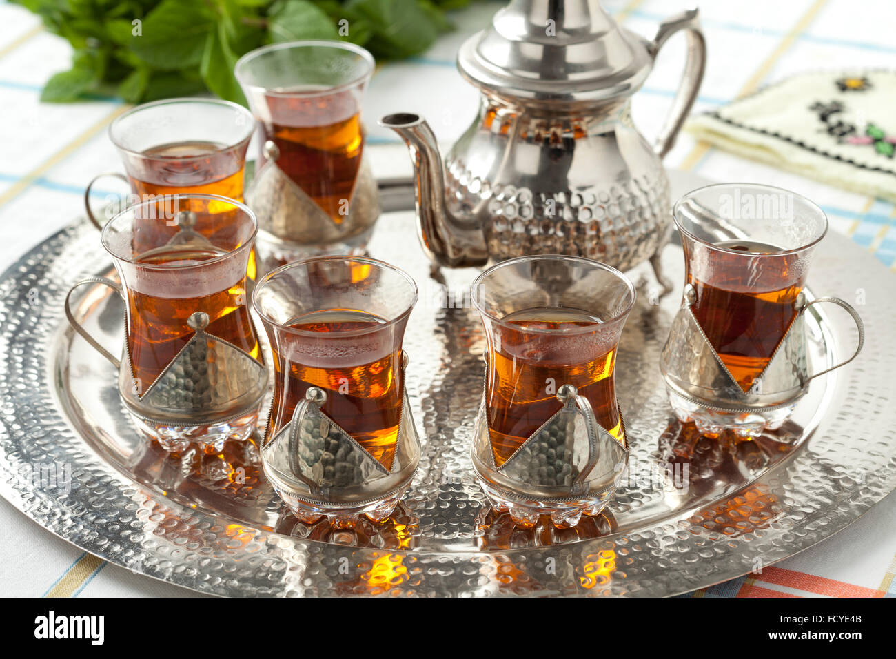 Traditional Moroccan tea glasses and pot on a tray Stock Photo - Alamy