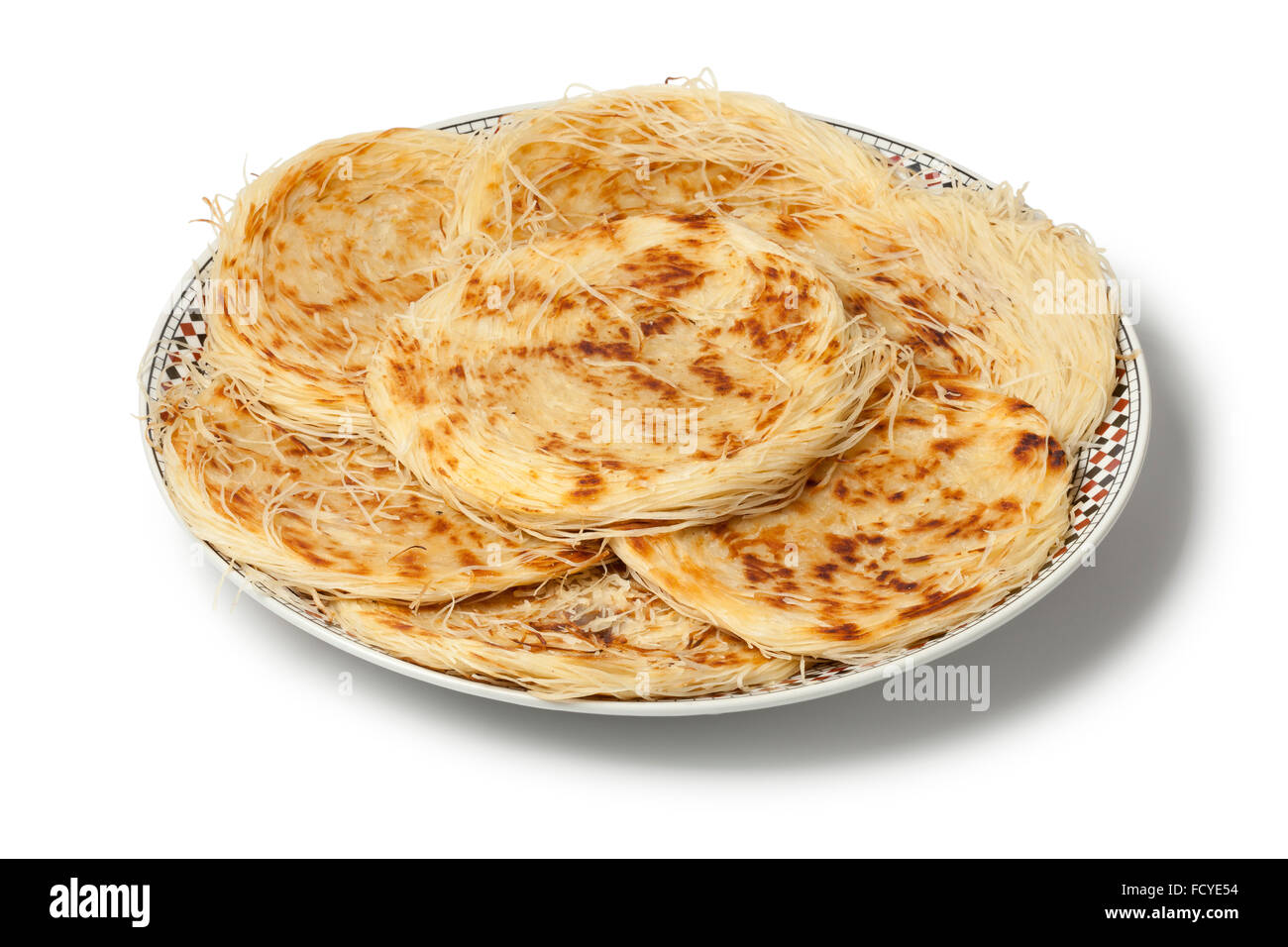 Dish with traditional Moroccan special pancake Razat El Quadi on white background Stock Photo