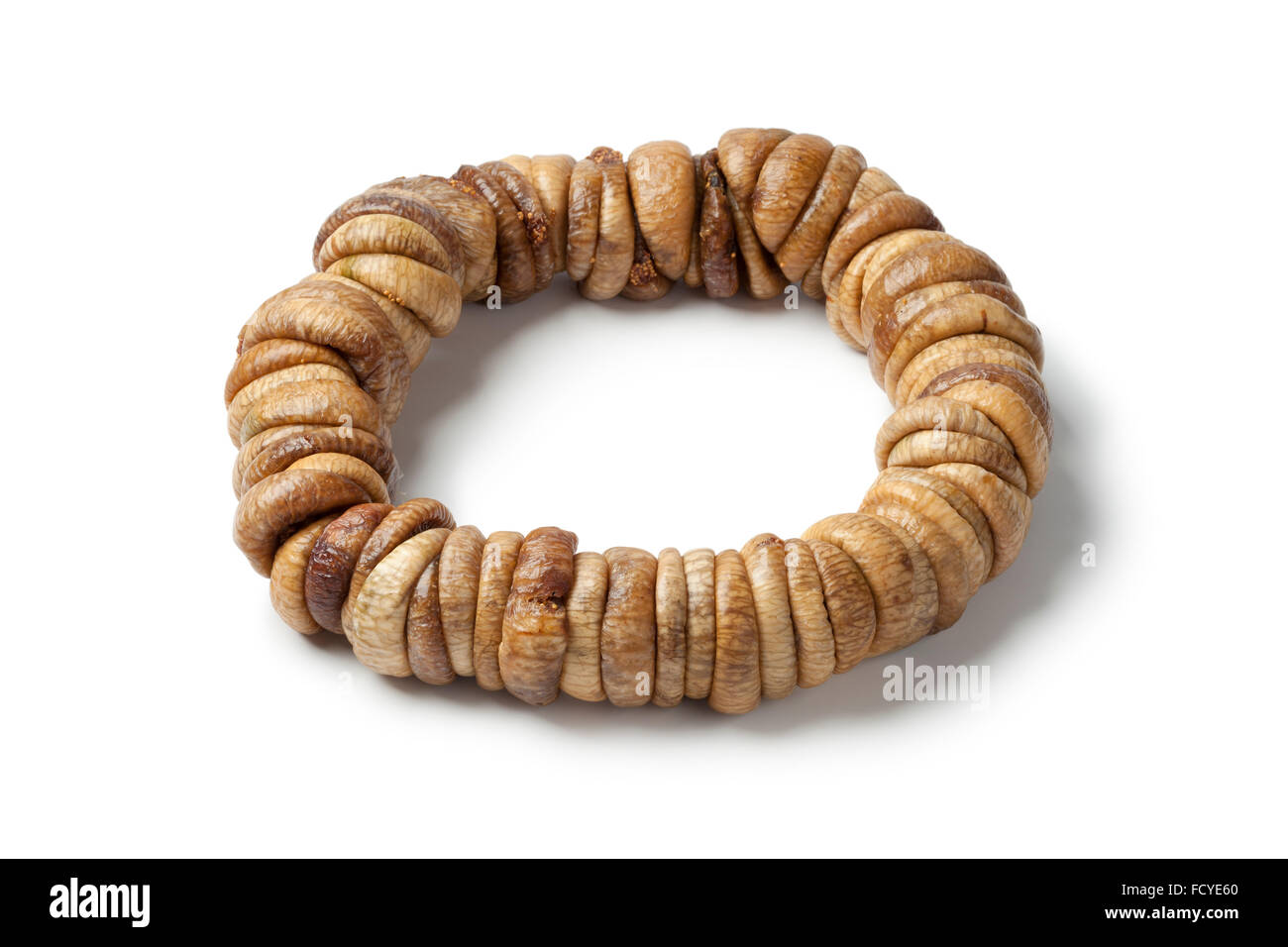 Traditional threaded Moroccan dried figs on white background Stock Photo