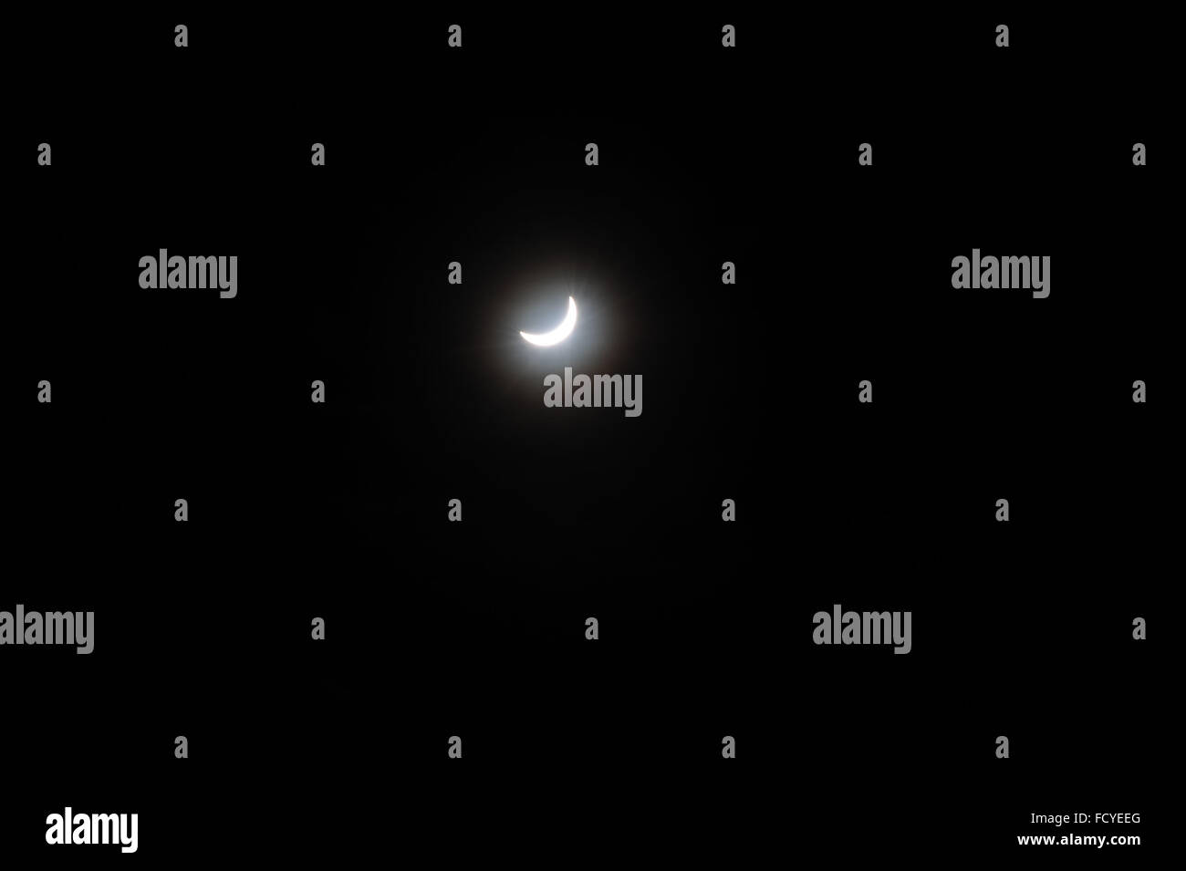The Moon during a solar eclipse. Stock Photo