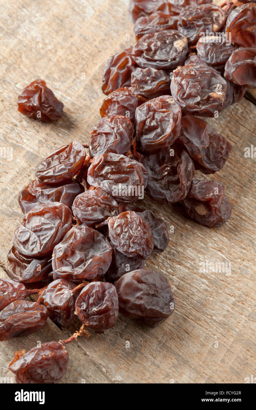 Twig of dried muscat raisins close up Stock Photo