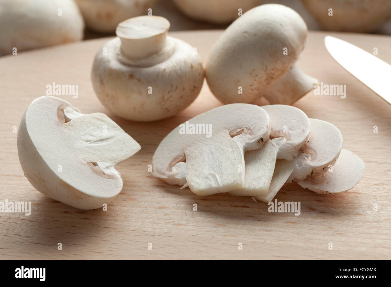 Fresh chestnut mushrooms and slices Stock Photo