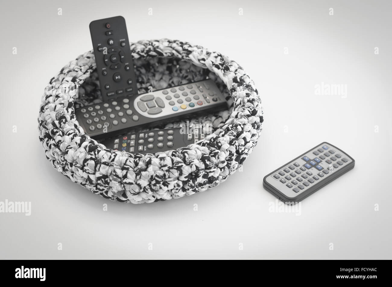 Pile of TV Remote Controls in a basket Stock Photo Alamy
