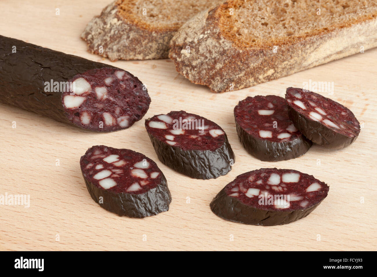 Traditional German black pudding sausage and slices Stock Photo