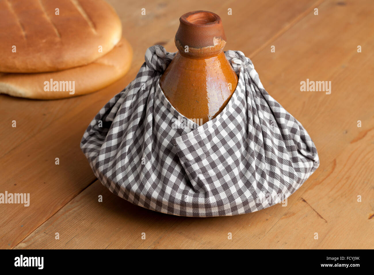 Traditional Moroccan tagine wrapped in a cloth as a gift and to keep warm Stock Photo