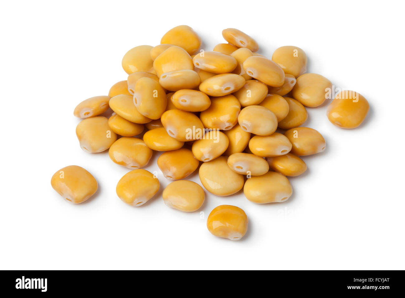 Pickled yellow lupin beans on white background Stock Photo