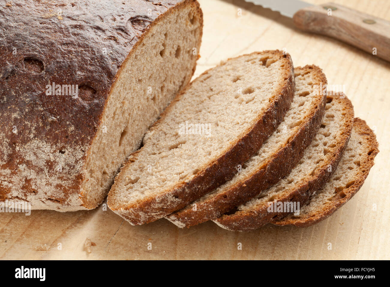 Loaf of healthy German Sourdough bread and slices Stock Photo