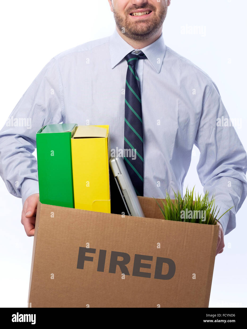 Fired businessman holding box with personal belongings isolated on white background. Stock Photo