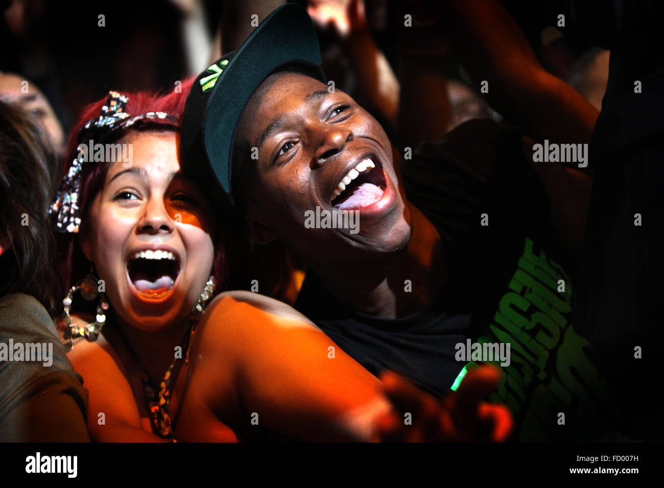 Excited fans in the crowd at Orange Rockcorps at Apollo theatre , Manchester . Stock Photo