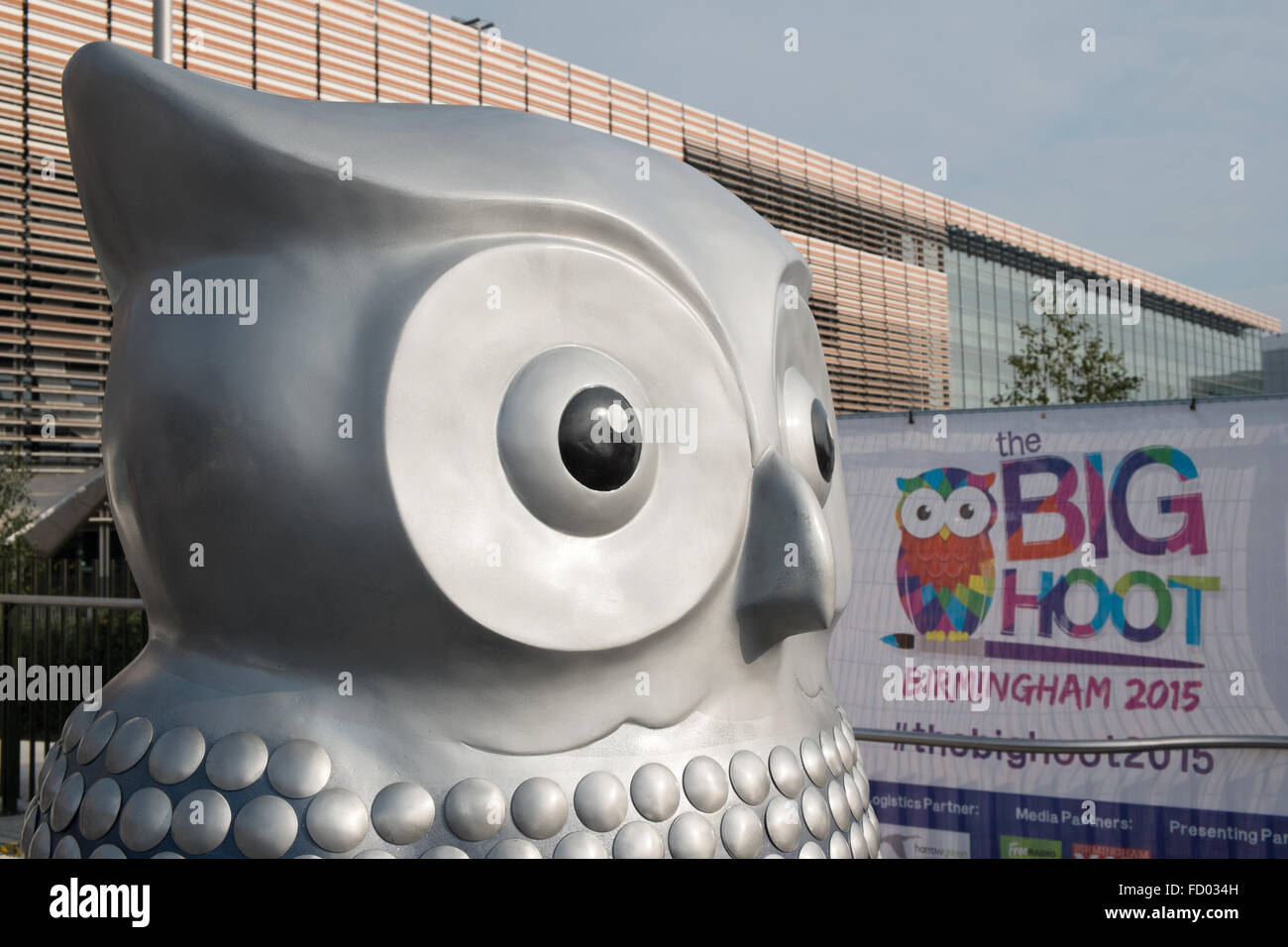 A silver painted owl made to look like the exterior of the Selfridges Store part of the Big Hoot Birmingham owl sculpture trail Stock Photo