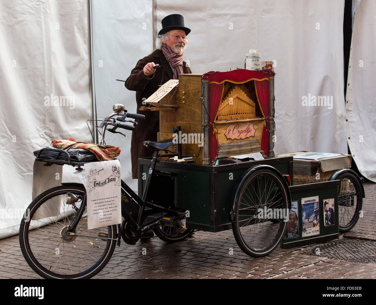 Street musician with barrel organ, Lier, Belgium Stock Photo