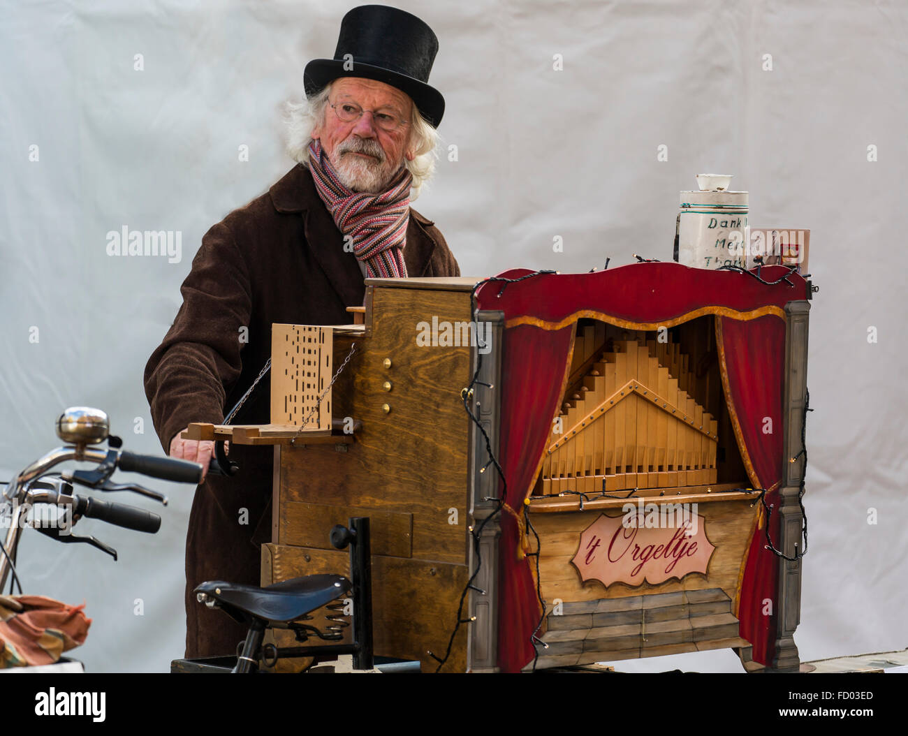 Street musician with barrel organ, Lier, Belgium Stock Photo