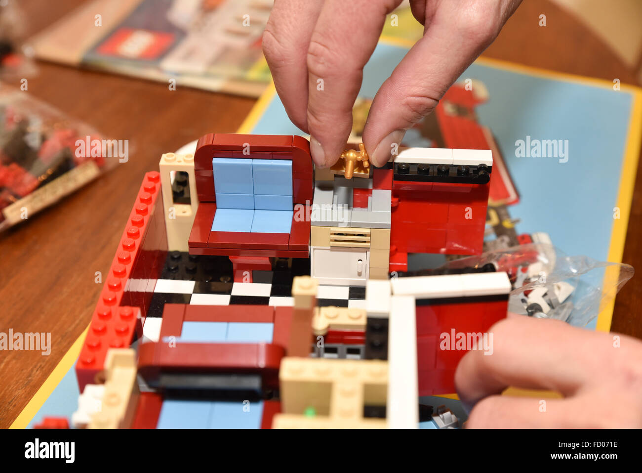 Constructing model kit hobby modelling LEGO 10220 volkswagen T1 Camper Van  Stock Photo - Alamy