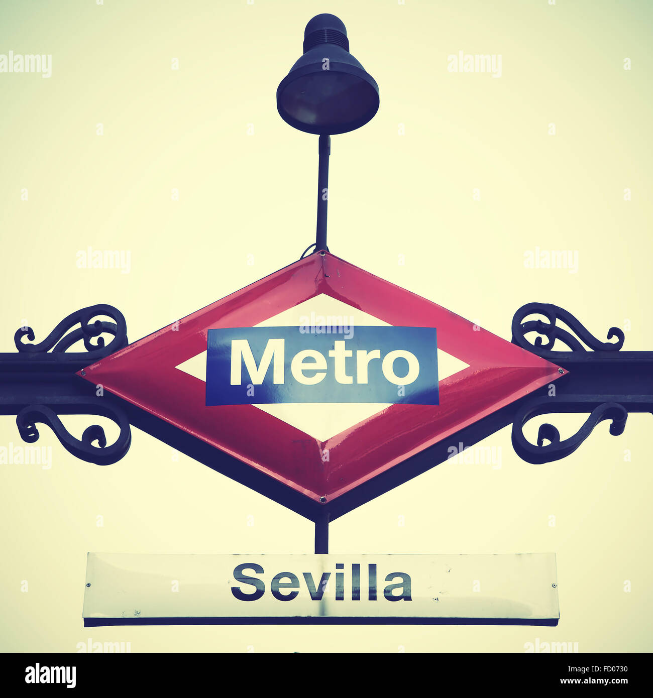 Metro sign in Madrid, Seville station. Vintage style filtred image Stock Photo