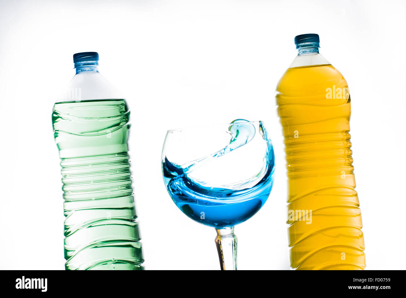 Color bottle and cup still life. high speed flash shooting Stock Photo