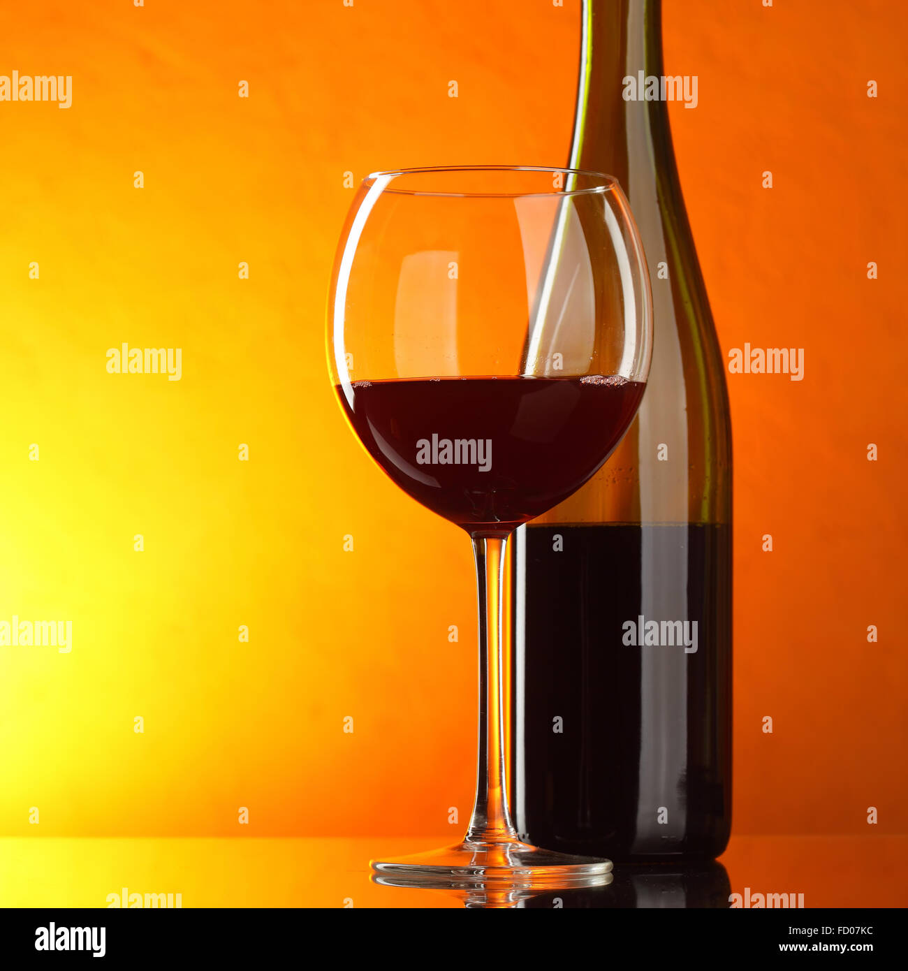 Red wine - still-life with glass and bottle with copyspace Stock Photo