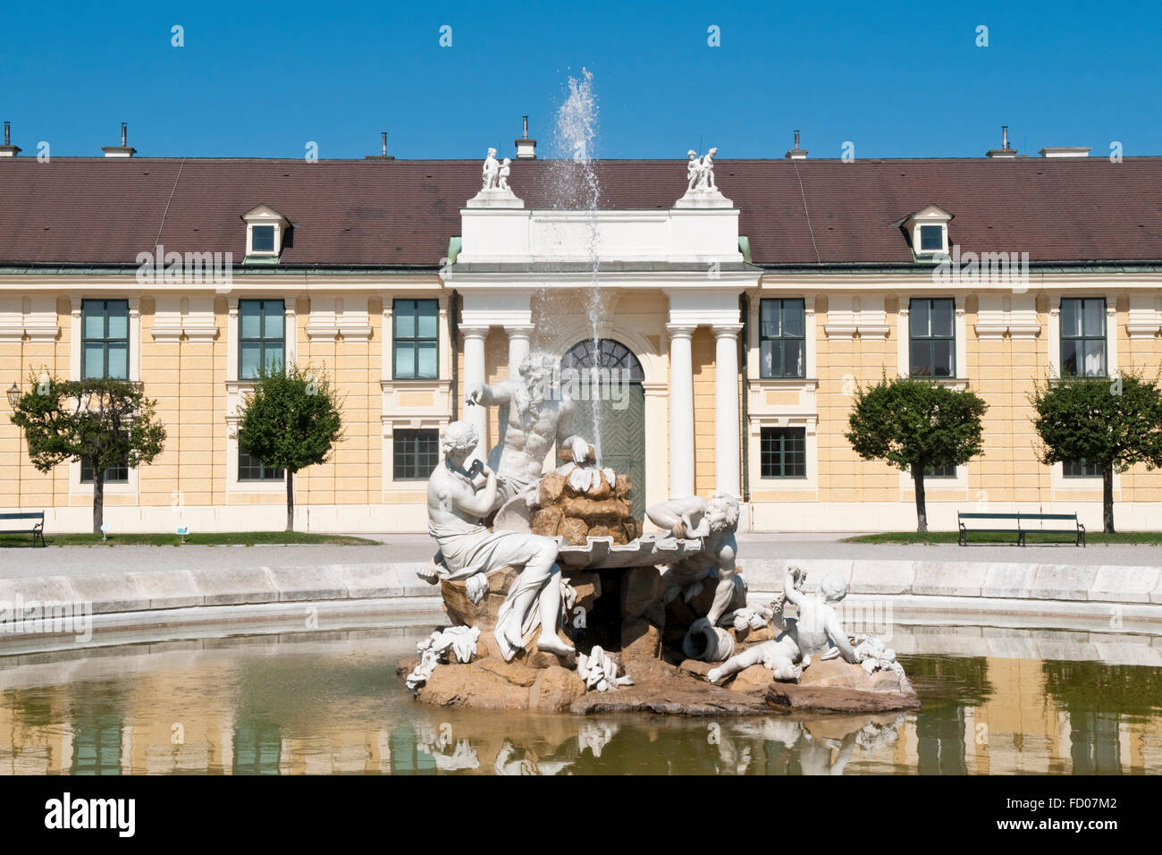 Fountain with statues representing the rivers Danube, Inn, and Enns at the Schonbrunn Palace in Vienna, Ausria Stock Photo